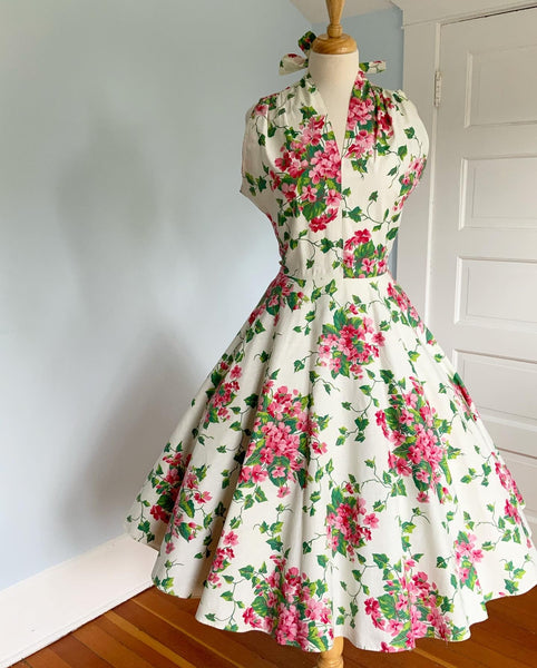 1950s Quintessential Polished Cotton Sundress with Tie Neckline in Vibrant "Busy Lizzies" Floral Print